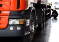 automobile mechanic checking truck in the garage, selective focus